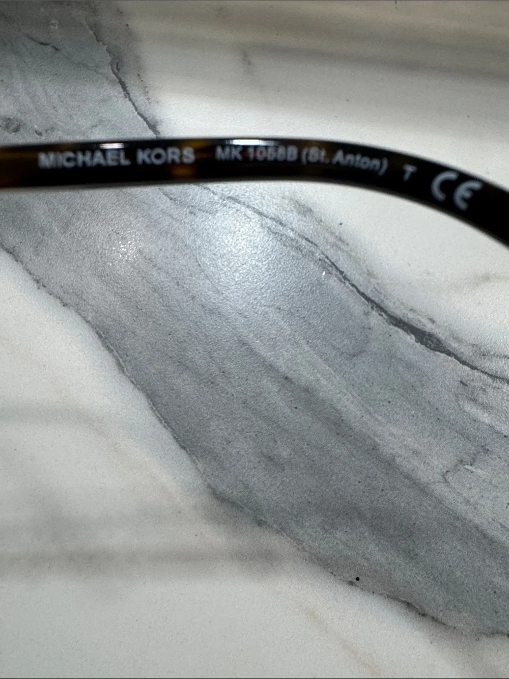 Michael Kors Black Rimless Sunglasses with Rhinestone Accents